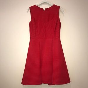Red cutoff sleeve dress.